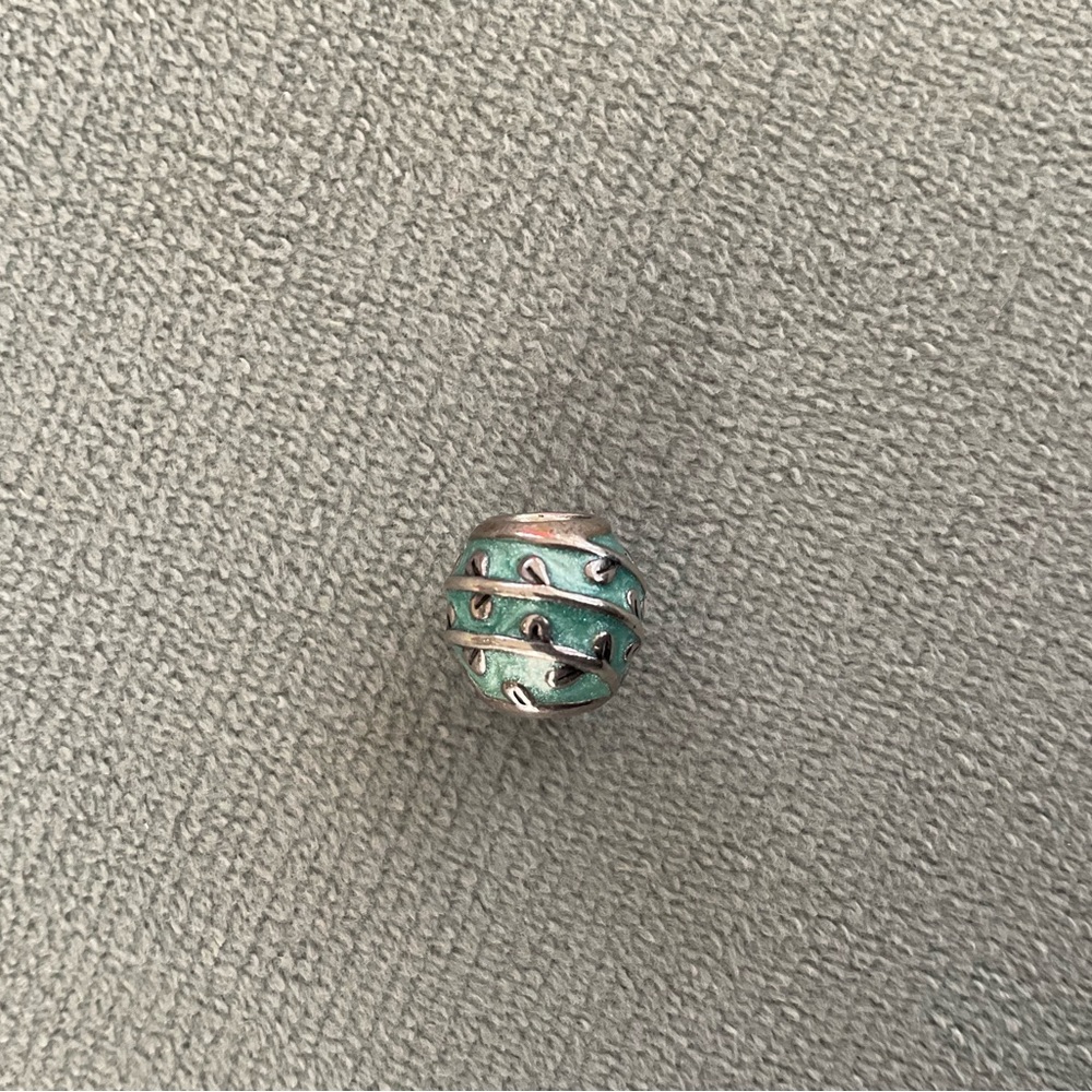 PANDORA retired charm. Light blue with vines